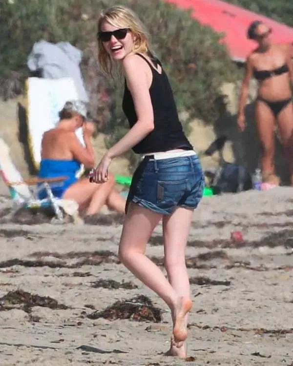Emma Stone shows off her beautiful feet at a party.